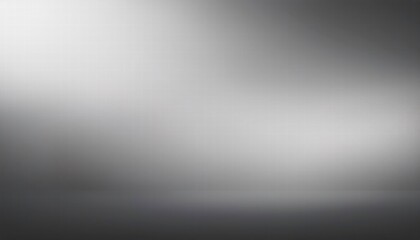 Obraz premium Abstract Gray Gradient Background with Spotlight: A smooth, minimalist backdrop with a subtle gradient, casting a soft spotlight, ideal for product displays, presentations, and graphic designs. 