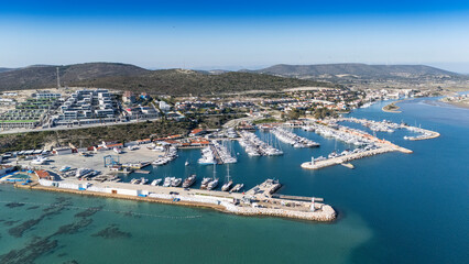 Fototapeta premium Aerial view of marina yacht club in turkey alacati port.