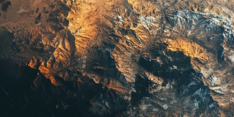 Majestic Mountain Range: An Aerial View of a Rugged Landscape