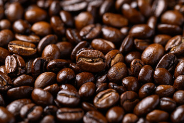 Dark roasted coffee beans background, Arabica coffee