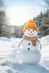 Fototapeta premium a snowman in a hat and scarf stands in a snowdrift against the backdrop of a forest on a clear day