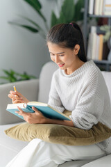 woman Hand writing ideas And taking notes
