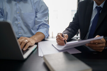 Lawyer Legal counsel presents to the client a signed contract with gavel and legal law. justice and lawyer Business partnership meeting concept.