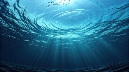 Obraz premium A mesmerizing underwater scene showing sunbeams penetrating the depths of the ocean, creating an ethereal and tranquil atmosphere