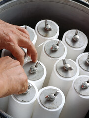 The process of replacing a water treatment filter cartridge