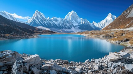 Naklejka premium Serene Turquoise Lake amidst Majestic Snow-Capped Peaks of the Himalayas