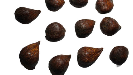 Close-up of snake fruit against white background