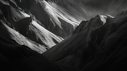 Black and White Mountain Range with Dramatic Shadows