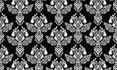 Geometric ethnic flower pattern for background,fabric,wrapping,clothing,wallpaper,Batik,carpet,embroidery style.