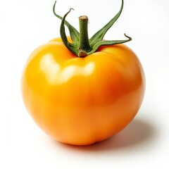 A vibrant yellow tomato rests against a clean white background, highlighting its smooth texture and unique color in a simple and elegant display of fresh produce