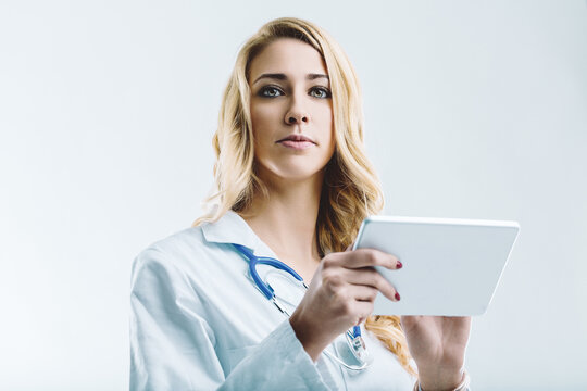 Doctor using digital tablet and exploring artificial intelligenc