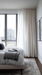 Fototapeta premium Serene contemporary bedroom with tufted headboard and gray accents