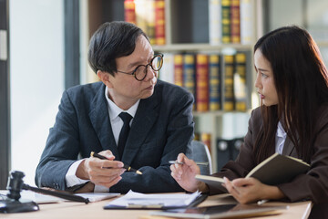 Lawyer or judge consult, Businessman and woman lawyers discussing about contract and agreement concept.