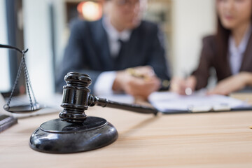 Lawyer or judge consult, Businessman and woman lawyers discussing about contract and agreement concept.