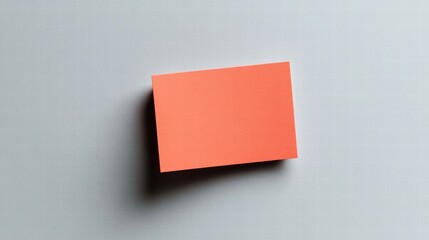 Coral Sticky Note on Gray Background