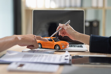 Car contract agreement concept. Asian car saleswoman and  customer. 