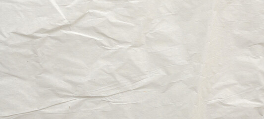 Abstract white crumpled and creased recycle paper texture background