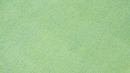 Green fabric texture background close up