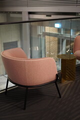 Modern seating arrangement in a stylish interior of a contemporary building in the city