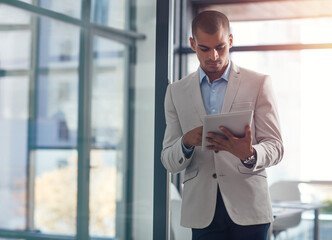 Fototapeta premium Businessman, lobby or reading on tablet for finance news, accounting report or budget research. Corporate, profit or financial advisor on touchscreen for schedule, investment or portfolio management