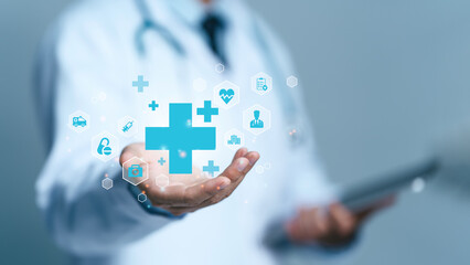 Male medicine doctor hold healthcare medical icons for the Health insurance concept in hospital background