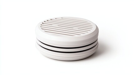 Obraz premium A round, white object with a slotted top, likely a kitchen or home accessory designed for ventilation or decoration.
