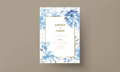 beautiful wedding invitation card with blue flower and leaves