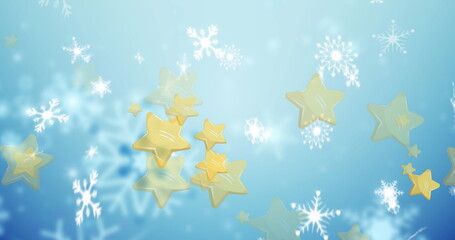 Fototapeta premium Image of stars over snow falling at christmas