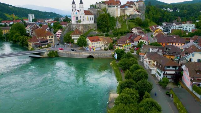 4K Drone Video of the Beautiful Festung Aarburg Castle and Reformierte Kirche Church along the Aare River in Quaint Aarburg, Switzerland