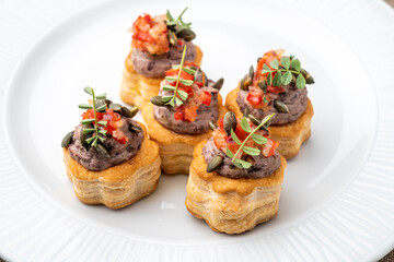 Gourmet appetiser on a white plate