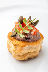 Gourmet appetiser on a white plate