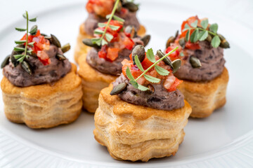 Gourmet appetiser on a white plate
