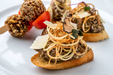 Gourmet appetiser on a white plate