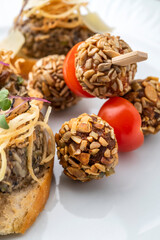 Gourmet appetiser on a white plate