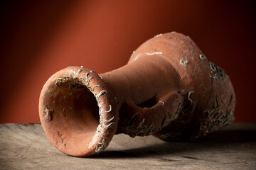 Old broken terracotta vase, handmade antique object
