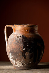 Old broken terracotta vase, handmade antique object
