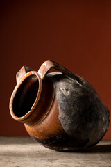 Old broken terracotta vase, handmade antique object
