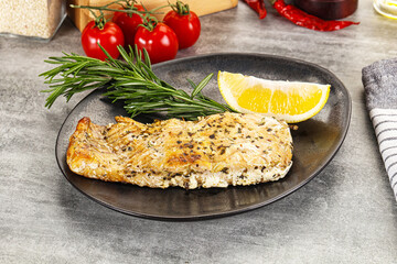 Baked salmon fish served rosemary