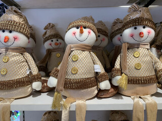 Cute Snowman Stuff toys wearing brown scarf