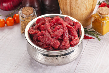 Raw beef meat - sliced strips