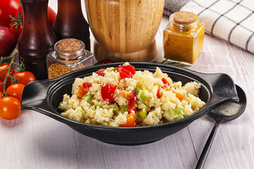 Vegan cuisine couscous with vegetables