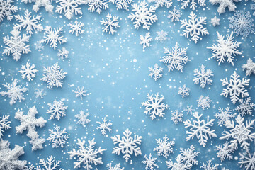 many snowflakes on a light blue background. winter or christmas background