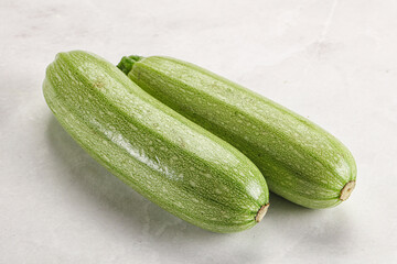 Raw green ripe zucchini vegetable