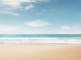 Serene beach with clear blue sky and calm ocean waves