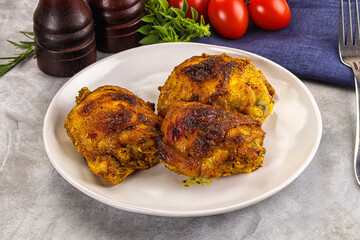 Roasted chicken thighs  with spices