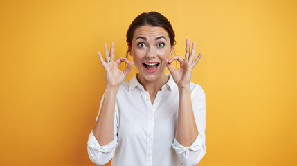 Excited Woman Making OK Gesture on Bright Orange Background, Copy Space