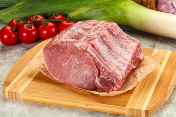 Raw pork loin cut with bone