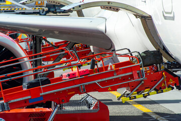 Baggage Unloading from Commercial Airplane