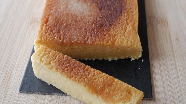 Traditional Spanish Turron Yema on slate board, perfect for festive moments