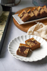 Slices of marble cake on white plates